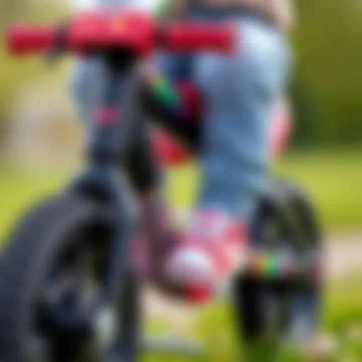 Close-up of a toddler's feet on a balance bike, emphasizing safety features