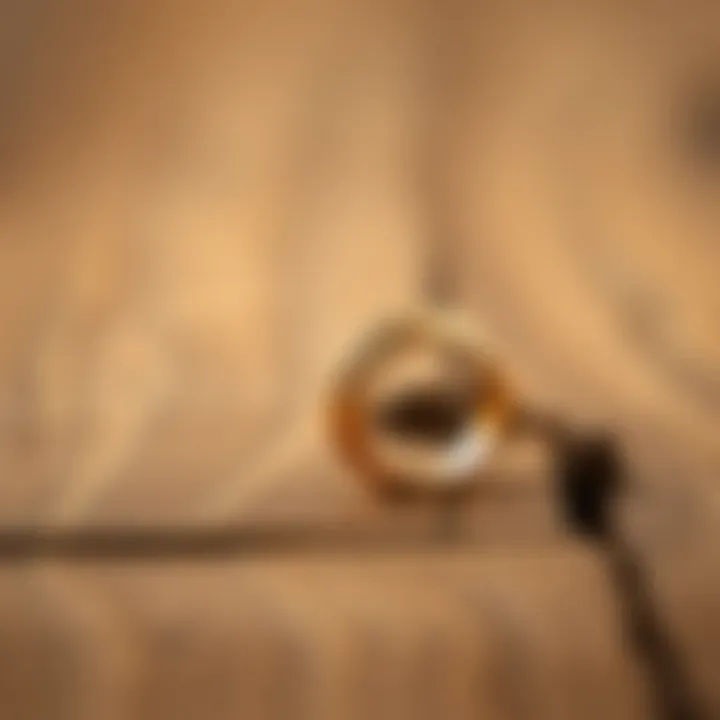 An elegant stress ring displayed on a wooden surface.